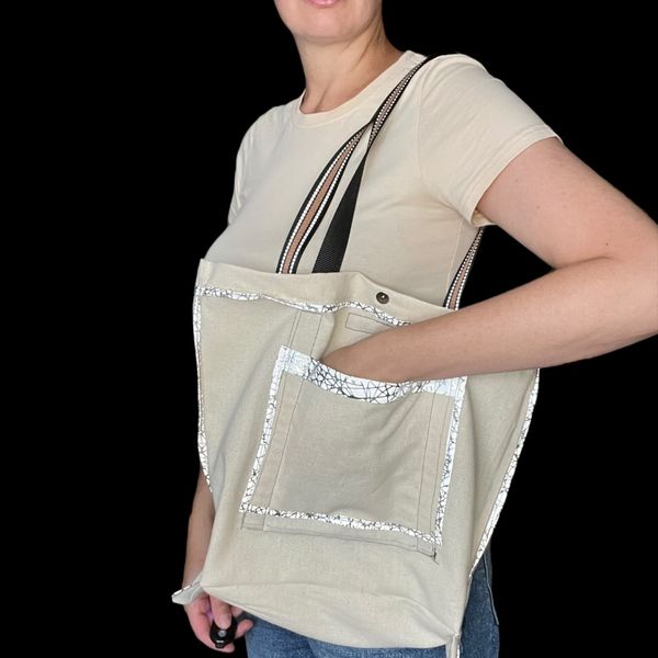 Svitashka shopper bag with leopard pockets and reflective handles