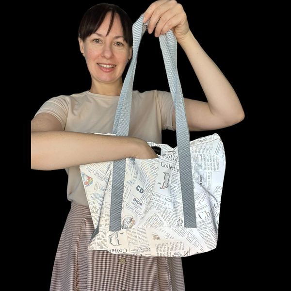 Women's reflective Svitashka shopper bag with zippered pockets. Gray handles