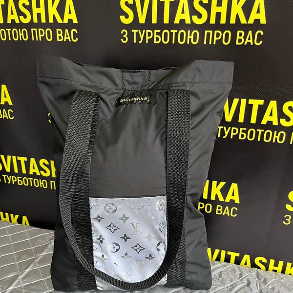 Svitashka black shopper with reflective pockets.