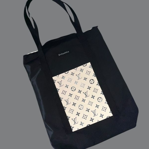 Svitashka bag in oxford fabric with reflective snake pockets. black