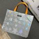 Reflective shopper bag Svitashka Stars orange handles magnetic button