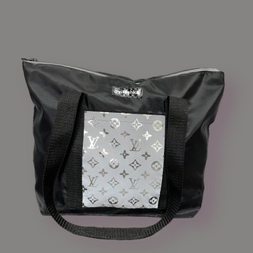 Shopper bag made of oxford fabric and reflective pockets on a snake