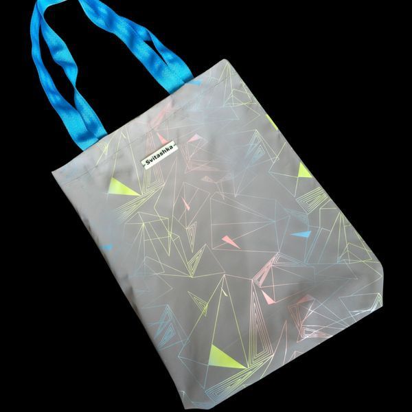Reflective Svitashka shopper Neon abstraction on a magnetic button. Blue handles