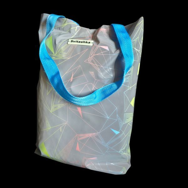 Reflective Svitashka shopper Neon abstraction on a magnetic button. Blue handles