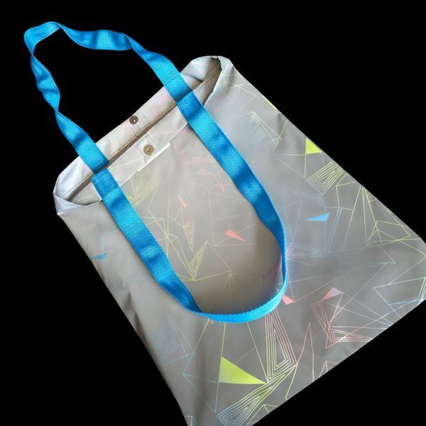 Reflective Svitashka shopper Neon abstraction on a magnetic button. Blue handles