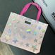 Svitashka stars reflective shopper with short pink handles on a magnetic button