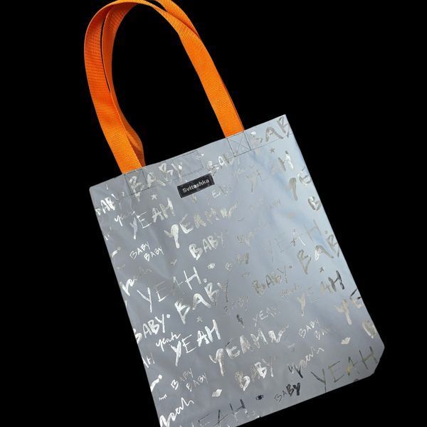 Svitashka reflective shopper bag with "Silver Babies" print, orange handles Reflective bag