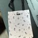 Reflective shopper bag Svitashka Black stars black handles on the button